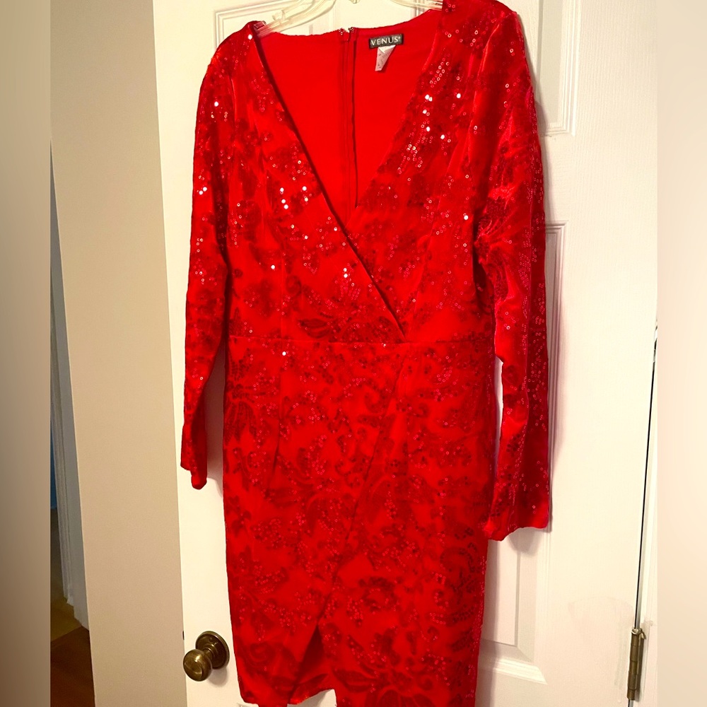 Perfect for the holidays! Red long sleeved velour and sequin dress